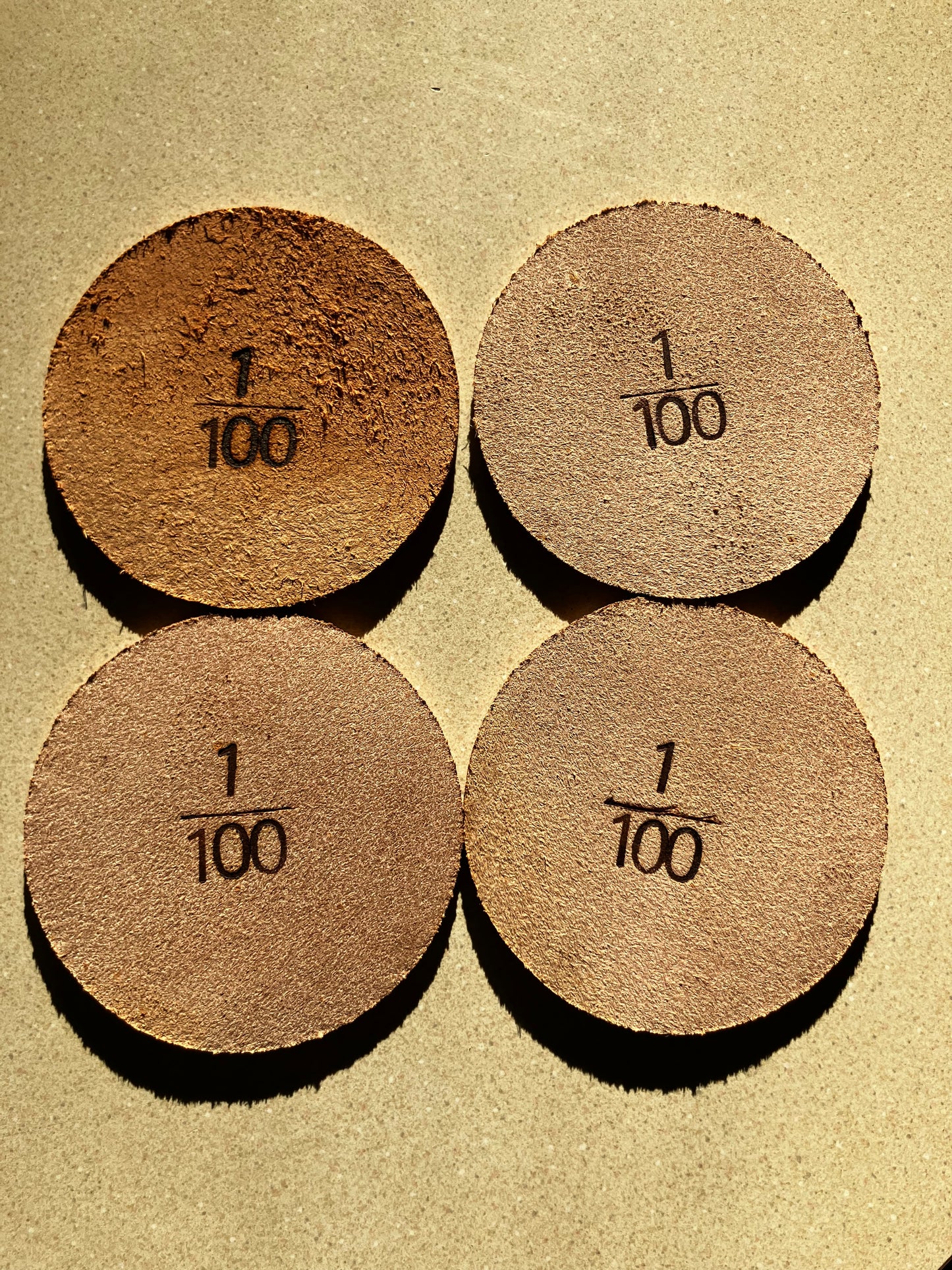 The “100K Edition” Leather Coaster