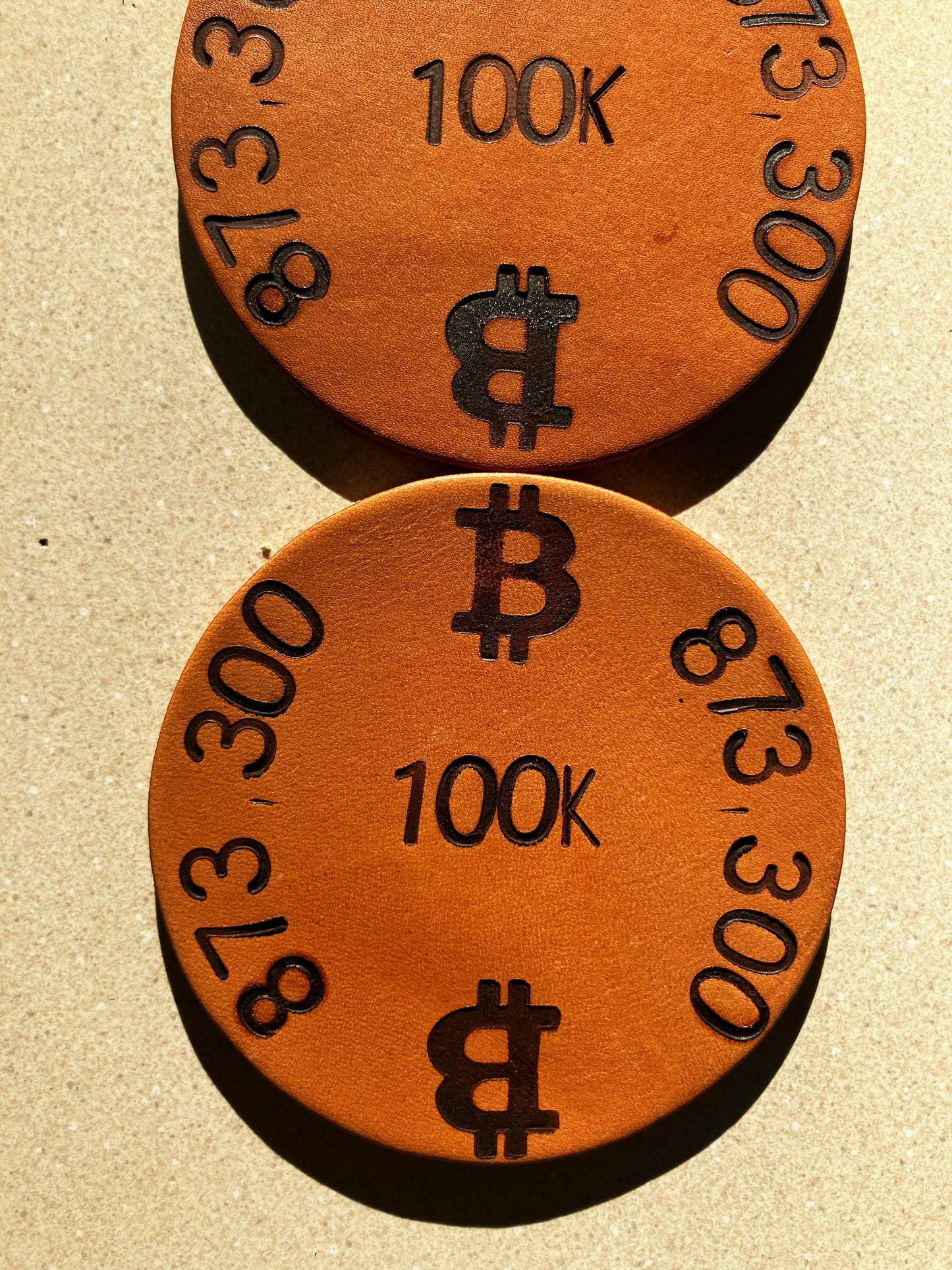 The “100K Edition” Leather Coaster