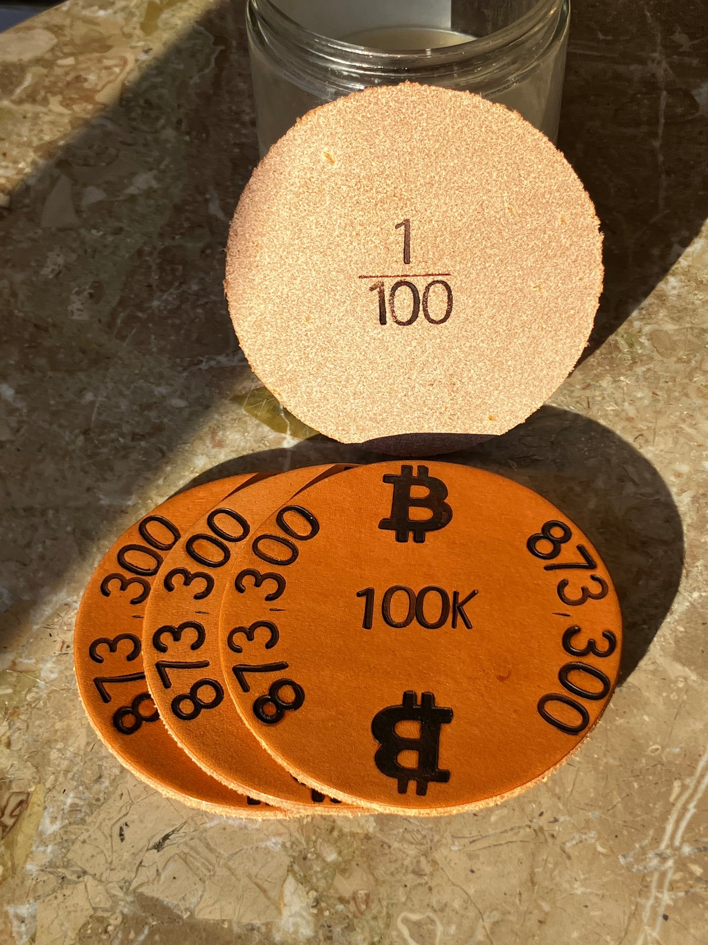 The “100K Edition” Leather Coaster