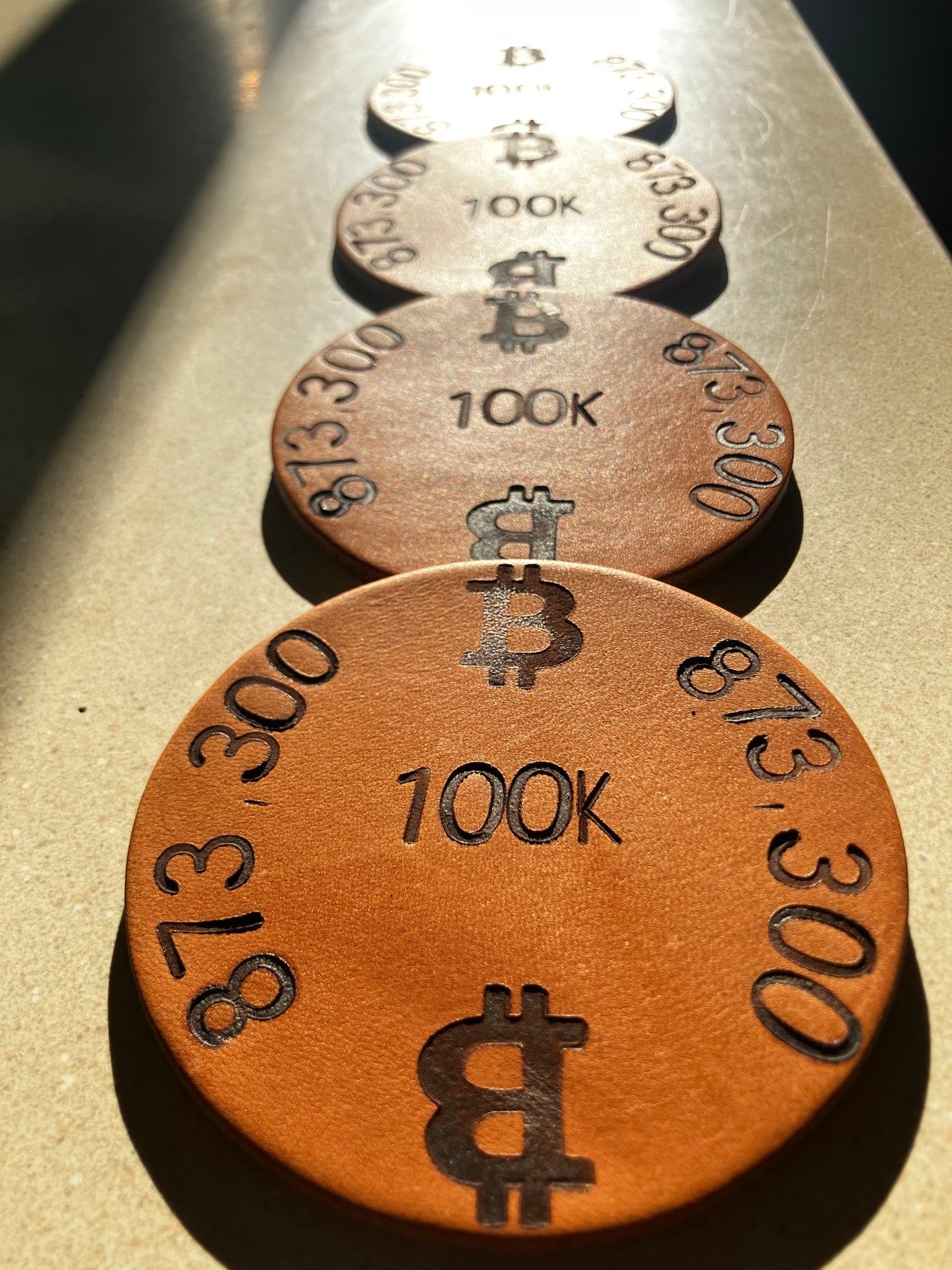 The “100K Edition” Leather Coaster